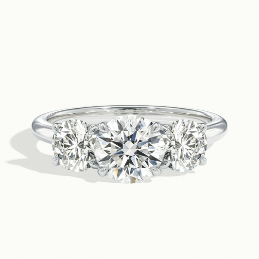 Cara 1.5 Carat Round Lab Grown Diamond Three Stone Engagement Ring in Platinum - view 1