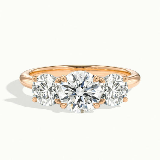Cara 2.5 Carat Round Lab Grown Diamond Three Stone Engagement Ring in 14K Rose Gold - view 1