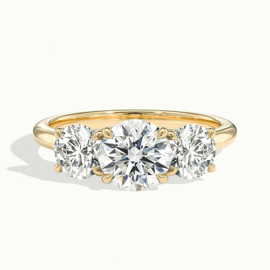 Cara 2.5 Carat Round Lab Grown Diamond Three Stone Engagement Ring in 18K Yellow Gold - view 1