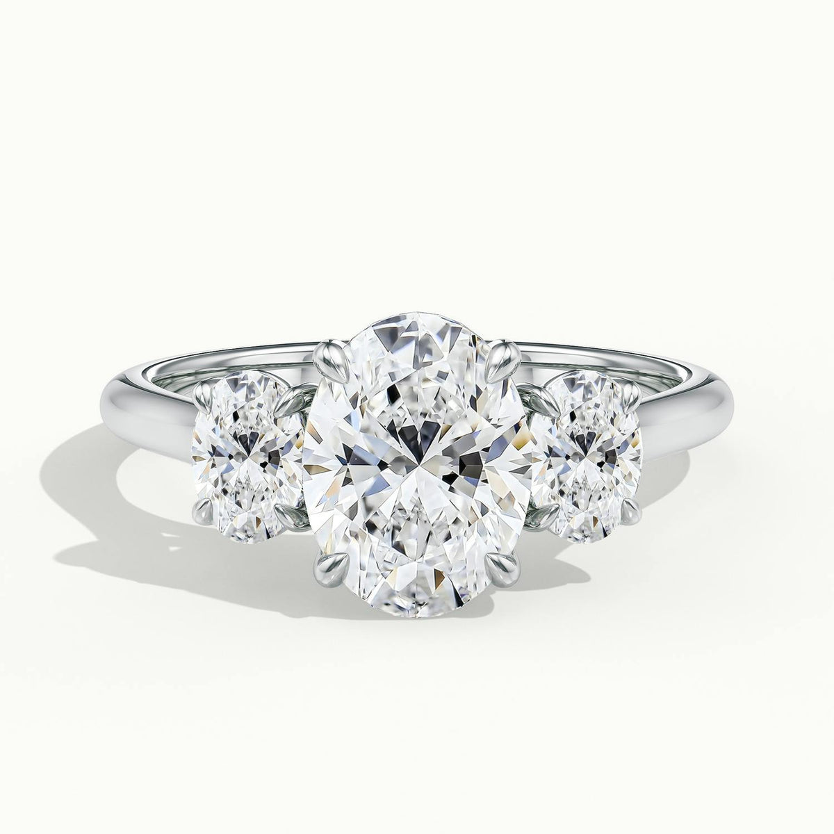 Calla 3.5 Carat Oval Lab Grown Diamond Three Stone Engagement Ring in 10K White Gold - view 1