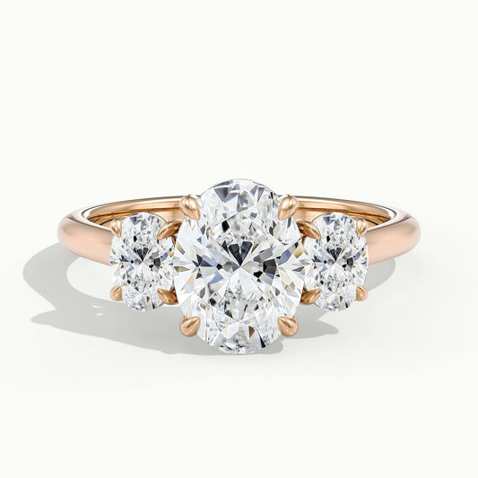 Calla 2.5 Carat Oval Lab Grown Diamond Three Stone Engagement Ring in 14K Rose Gold - view 1