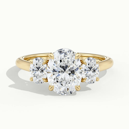 Calla 2.5 Carat Oval Lab Grown Diamond Three Stone Engagement Ring in 18K Yellow Gold - view 1