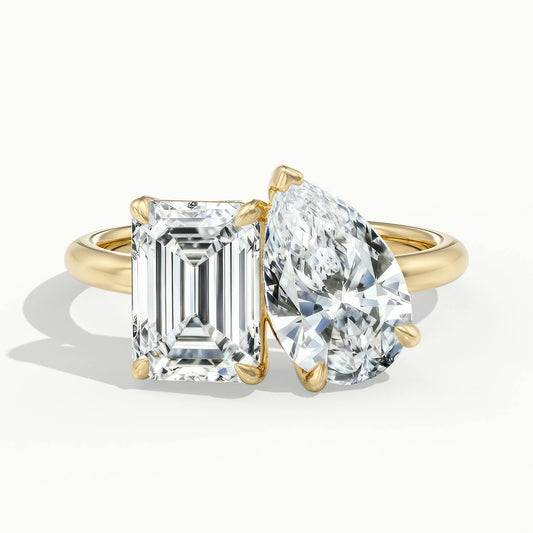 Gemma 2.5 Carat Emerald & Pear Lab Grown Diamond Toi et Moi Engagement Ring in 14K Yellow Gold - view 1