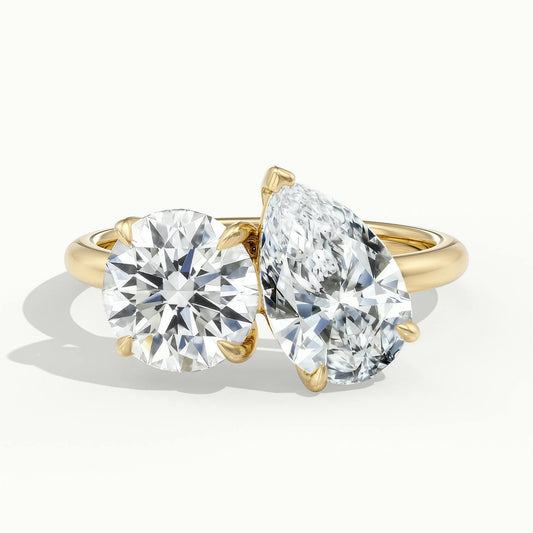 Gemma 2.5 Carat Round & Pear Lab Grown Diamond Toi et Moi Engagement Ring in 18K Yellow Gold - view 1