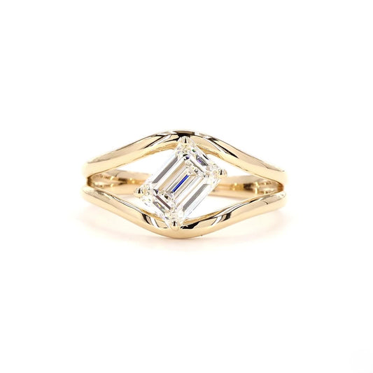 Emerald Tangent Solitaire Engagement Ring In 14K Yellow Gold