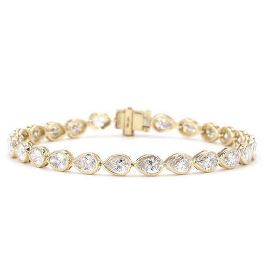 Pear Cut Lab Grown Diamond Bezel Tennis Bracelet In 14K Yellow Gold