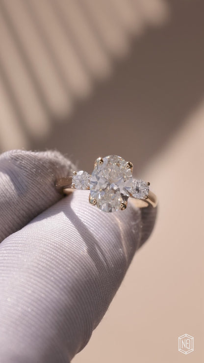 2.53 Carat Oval Cut Lab Grown Diamond Trellis Three-Stone Engagement Ring