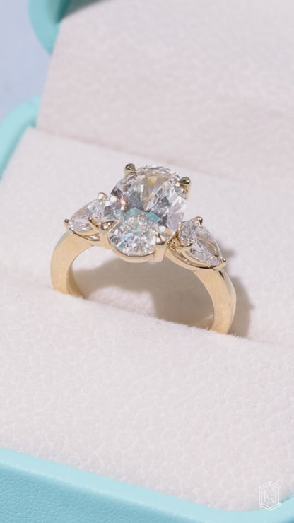 4.06 Carat Oval Cut Lab Grown Diamond Trellis Three-Stone Engagement Ring