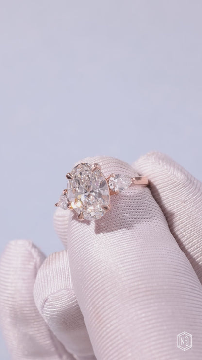 4.03 Carat Oval Cut Lab Grown Diamond Trellis Three-Stone Engagement Ring