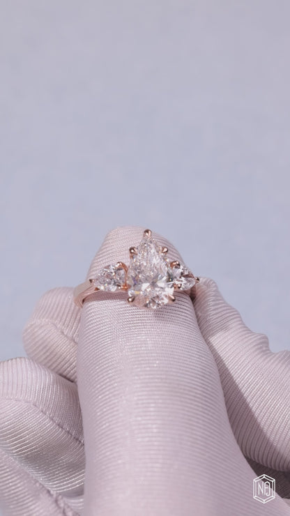 4.01 Carat Pear Cut Lab Grown Diamond Trellis Three-Stone Engagement Ring