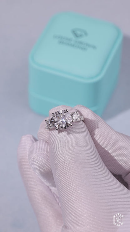 4.09 Carat Round Cut Lab Grown Diamond Trellis Three-Stone Engagement Ring
