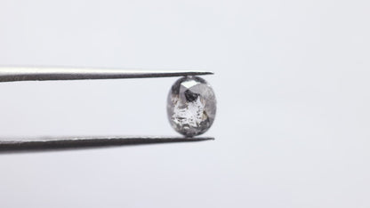 0.66 Ct Oval Cut / Facet Style Salt and Pepper Diamond